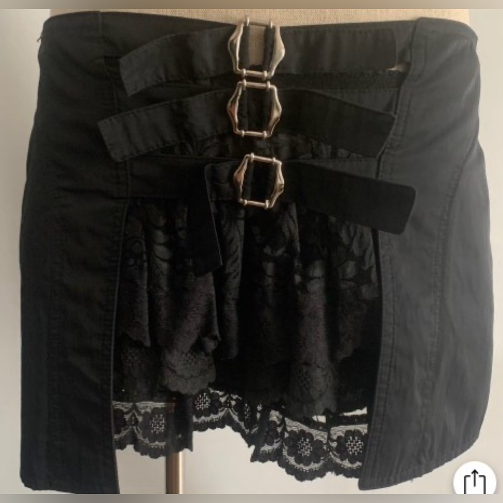 Maille Demoiselle: Black Mini Skirt with Lace and Buckle Details